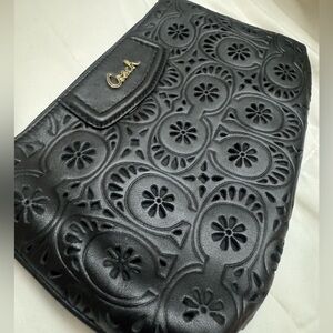 Coach black wristlet. BNWT. Cutouts
